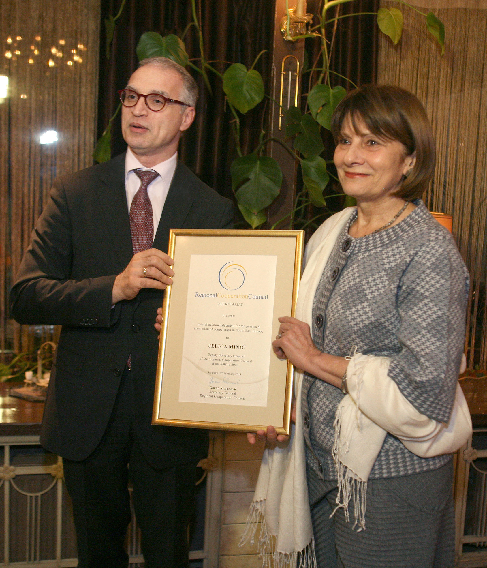 RCC Secretary General, Goran Svilanovic, hands the acknowledgement for the persistent promotion of cooperation in South East Europe to Jelica Minic, former Deputy RCC Secretary General,in Sarajevo, BiH on 27 February 2014 . (Photo: RCC/Zoran Kanlic)