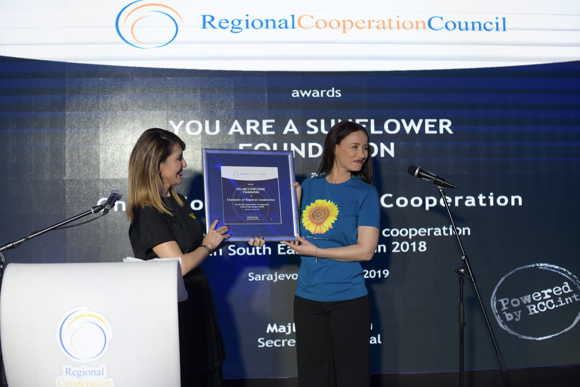 RCC Secretary General Majlinda Bregu presents the Champion of Regional Cooperation 2018 award to the Founder and Chair of You are a Sunflower Foundation, Albana Osmani at the reception marking the 11th anniversary of the RCC on 13 March 2019 in Sarajevo. (Photo: RCC/Eldin Hasanagic) 