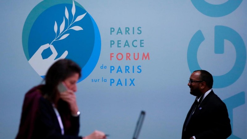 Photo: A visitor attends the Paris Peace Forum in Paris, France. REUTERS 