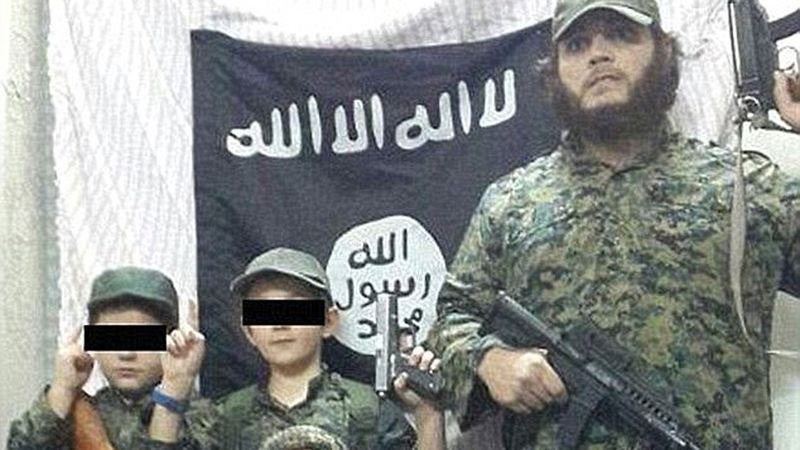 Australian terrorist Khaled Sharrouf, who is likely dead, pictured with his sons in Syria. Photo Credit: www.9news.com.au