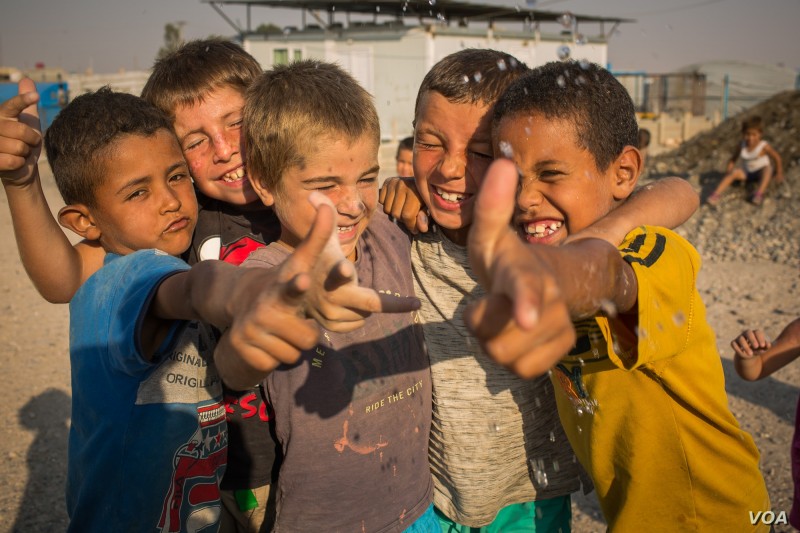 Photo: Hundreds of children of IS militants have died in or on their way to al-Hol camp this year, pictured on Aug. 26, 2019 in al-Hol Camp, Syria. (VOA/Yan Boechat)