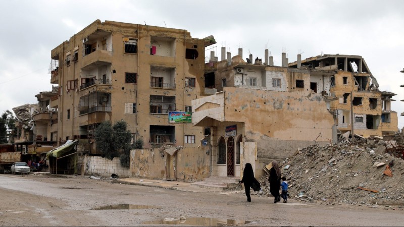 Photo: Destroyed buildings in central Raqqa city, northeastern Syria. Photo Credits: EPA-EFE/AHMED MARDNLI