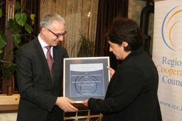 Director of the South East European Centre for Entrepreneurial Learning (SEECEL), Efka Heder, on behalf of her organisation, receives RCC's Champion of Regional Cooperation award for 2013 from RCC Secretary General, Goran Svilanović, in Sarajevo, BiH on 27 February 2014 . (Photo: RCC/Zoran Kanlic)