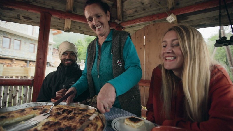 Fetije Nikiqi welcoming her guests from Germany at her B&B along Via Dinarica hiking trail which runs across the Western Balkans (Photo: RCC/Klicker)