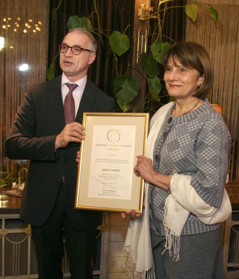 RCC Secretary General, Goran Svilanovic, hands the acknowledgement for the persistent promotion of cooperation in South East Europe to Jelica Minic, former Deputy RCC Secretary General,in Sarajevo, BiH on 27 February 2014 . (Photo: RCC/Zoran Kanlic)