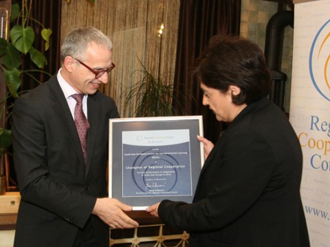Director of the South East European Centre for Entrepreneurial Learning (SEECEL), Efka Heder, on behalf of her organisation, receives RCC's Champion of Regional Cooperation award for 2013 from RCC Secretary General, Goran Svilanović, in Sarajevo, BiH on 27 February 2014 . (Photo: RCC/Zoran Kanlic)